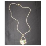 clear beads with flower pendent