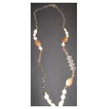 clear bead and shell necklace
