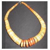 small and large round shell like beads