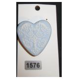 blue heart brooch with white filigree