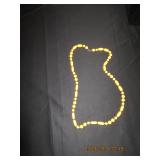 Yellow bead necklace