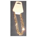 2 goldtone bracelets