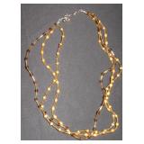 3 strand amber colored seed bead necklace