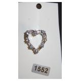 Silver heart with blue gems