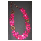 long pink and brown wooden necklace
