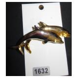 gold and silver dolphins