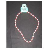 red and white shell necklace