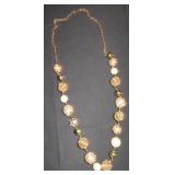 white swirled and gold mesh necklace