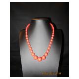 Red graduated bead necklace