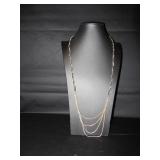 Long silver tone necklace