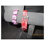 2 bracelets One purple gems and a magnetic one