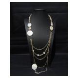 Shell and gold tone chain necklace