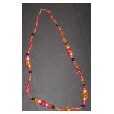 orange, red, and pink beads with gold accents