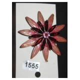 Flower brooch with red gems