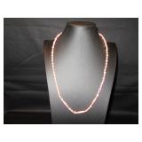 Salmon colored rolled paper necklace