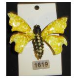 yellow butterfly with clear gems