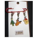 red pin with reindeer and santa