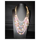 Pink, blush colored beads with leather necklace