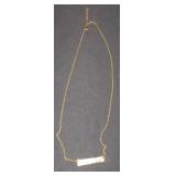 gold chain with gold bar pendant