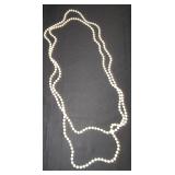 extra long strand of faux pearls