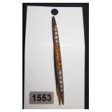 long brooch with clolored gems