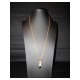 Rope necklace with beads hanging down
