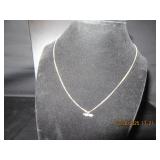 Fine silver tone necklace with small crystal