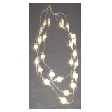 3 strand necklace with pearl like beads