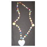 multicolored swirled beads with blue heart