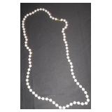 long strand of faux pearls