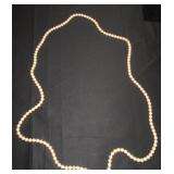 long strand of faux pearls