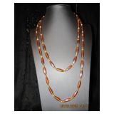 Long brown and gold beaded necklace