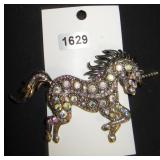 unicorn brooch with gems