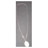silver chain with Mother Teresa pendent