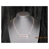 Gold tone bar necklace