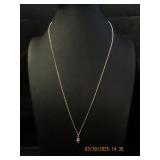 Gold tone pine cone pendant with necklace