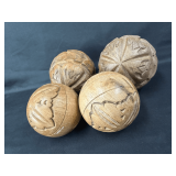Set of Four Carved Wooden Decorative Spheres
