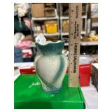 antique vase has crazing and dings