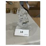small teetering glass elephant figurine