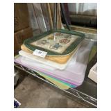 lot of cutting boards, trays, etc.