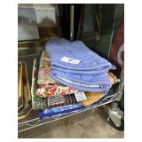 lot of oven mitts, etc.