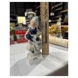 blue and white girl figurine
