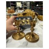 lot of candle sticks and candles