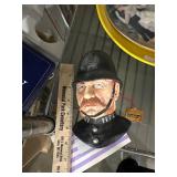 Bossons head police man with tag