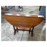 slender antique drop leaf table