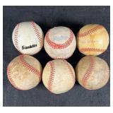 6  Misc baseballs  ( some signed ) unknown
