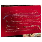 Necklaces In Various States Of Repair