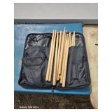 Twelve drumsticks with carry case