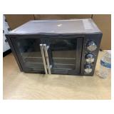OSTER 2-DOOR ELECTRIC TOASTER OVEN - works