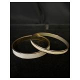 2 white enamel bracelets 1 Napier, 1 Monet